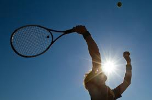 Peter Deth playing tennis